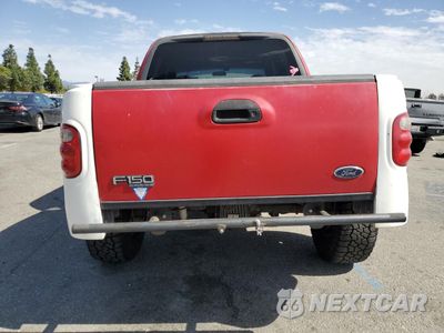 Zdjęcie 6 z 14 samochodu: 2001 FORD F150 SUPERCREW VIN:1FTRW07LX1KE40108 - miniatura