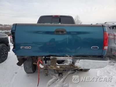Zdjęcie 6 z 12 samochodu: 2000 FORD F150 LARIAT VIN:1FTRX18L2YNB78644 - miniatura