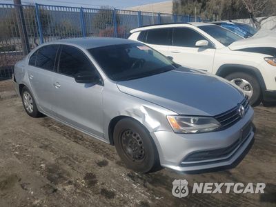 Czwarte zdjęcie samochodu z boku: 2015 VOLKSWAGEN JETTA BASE VIN:3VW2K7AJXFM416692 - miniatura