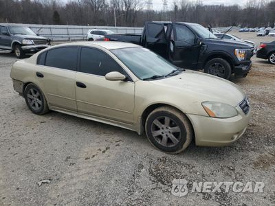 Czwarte zdjęcie samochodu z boku: 2003 NISSAN ALTIMA BASE VIN:1N4AL11D43C196519 - miniatura