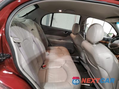 Zdjęcie 10 z 14 samochodu: 2002 LINCOLN CONTINENTAL VIN:1LNHM97V42Y687688 - miniatura