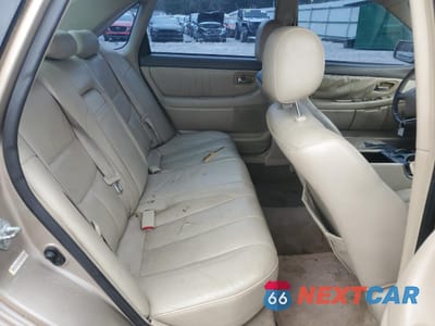 Zdjęcie 10 z 12 samochodu: 2003 TOYOTA AVALON XL VIN:4T1BF28B63U278046 - miniatura