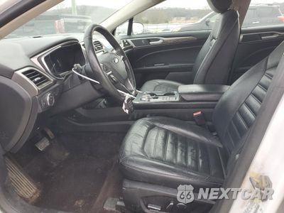 Zdjęcie 7 z 12 samochodu: 2017 FORD FUSION SE HYBRID VIN:3FA6P0LU0HR359676 - miniatura