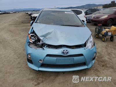 Piąte zdjęcie samochodu w środku: 2012 TOYOTA PRIUS C VIN:JTDKDTB39C1015312 - miniatura