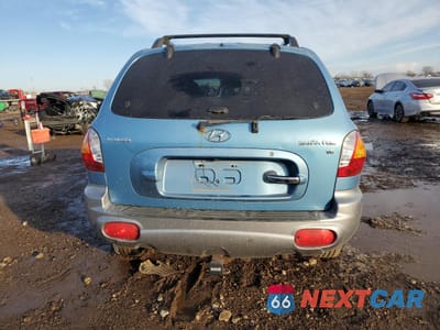 Zdjęcie 6 z 14 samochodu: 2003 HYUNDAI SANTA FE GLS VIN:KM8SC13D63U563292 - miniatura