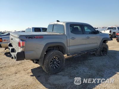 Trzecie zdjęcie samochodu z tyłu: 2021 TOYOTA TACOMA DOUBLE CAB VIN:3TMCZ5AN5MM391157 - miniatura