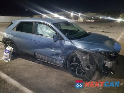 Czwarte zdjęcie samochodu z boku: 2022 HYUNDAI IONIQ 5 SE VIN:KM8KMDAF5NU100873 - miniatura