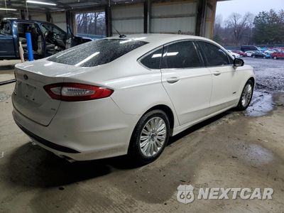 Trzecie zdjęcie samochodu z tyłu: 2016 FORD FUSION SE PHEV VIN:3FA6P0PU0GR272675 - miniatura