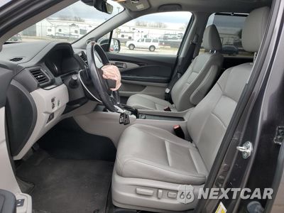 Zdjęcie 7 z 14 samochodu: 2019 HONDA PILOT TOURING VIN:5FNYF5H61KB007759 - miniatura