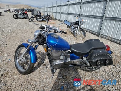 Trzecie zdjęcie samochodu z tyłu: 2016 SUZUKI LS650 VIN:JS1NP41A5G2106128 - miniatura