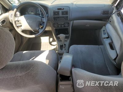 Zdjęcie 8 z 12 samochodu: 2001 TOYOTA COROLLA CE VIN:1NXBR12E21Z520994 - miniatura