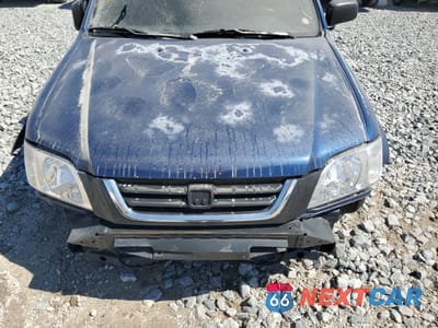 Zdjęcie 13 z 16 samochodu: 1999 HONDA CR-V LX VIN:JHLRD1840XC025968 - miniatura