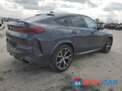 Trzecie zdjęcie samochodu z tyłu: 2020 BMW X6 M50I VIN:5UXCY8C08L9B12708 - miniatura