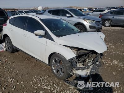 Czwarte zdjęcie samochodu z boku: 2014 FORD FOCUS SE VIN:1FADP3K23EL150953 - miniatura