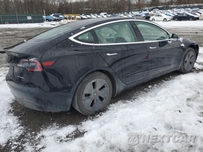 Trzecie zdjęcie samochodu z tyłu: 2019 TESLA MODEL 3 VIN:5YJ3E1EB4KF390572 - miniatura