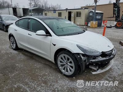Czwarte zdjęcie samochodu z boku: 2021 TESLA MODEL 3 VIN:5YJ3E1EAXMF048232 - miniatura