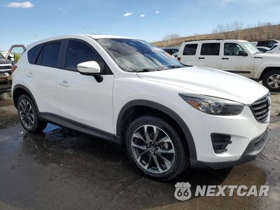 Czwarte zdjęcie samochodu z boku: 2016 MAZDA CX-5 GT VIN:JM3KE4DY6G0732913 - miniatura