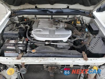 Zdjęcie 12 z 14 samochodu: 2004 NISSAN PATHFINDER SE VIN:JN8DR09Y74W911658 - miniatura