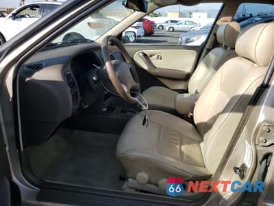 Zdjęcie 7 z 14 samochodu: 1996 INFINITI G20 VIN:JNKCP01D9TT534495 - miniatura