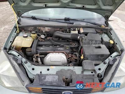 Zdjęcie 11 z 12 samochodu: 2003 FORD FOCUS SE COMFORT VIN:1FAFP34333W104260 - miniatura