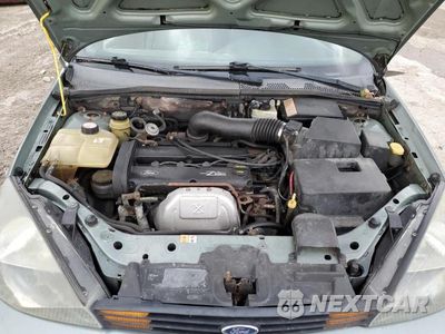 Zdjęcie 11 z 12 samochodu: 2003 FORD FOCUS SE COMFORT VIN:1FAFP34333W104260 - miniatura
