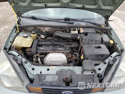 Zdjęcie 11 z 12 samochodu: 2003 FORD FOCUS SE COMFORT VIN:1FAFP34333W104260 - miniatura