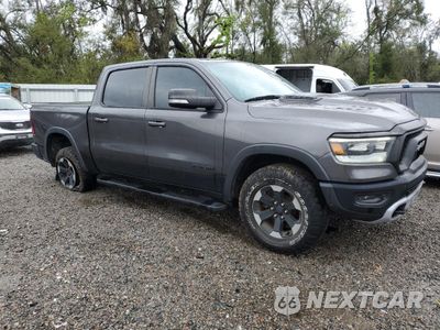 Czwarte zdjęcie samochodu z boku: 2019 RAM 1500 REBEL VIN:1C6SRFLT7KN767302 - miniatura
