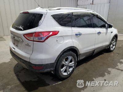 Trzecie zdjęcie samochodu z tyłu: 2016 FORD ESCAPE SE VIN:1FMCU0GXXGUA07069 - miniatura