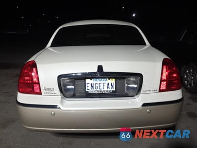Zdjęcie 6 z 12 samochodu: 2004 LINCOLN TOWN CAR ULTIMATE VIN:1LNHM83W64Y665171 - miniatura