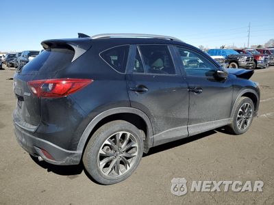 Trzecie zdjęcie samochodu z tyłu: 2016 MAZDA CX-5 GT VIN:JM3KE2DY0G0724553 - miniatura