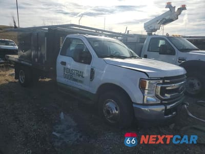 Czwarte zdjęcie samochodu z boku: 2021 FORD F350 SUPER DUTY VIN:1FDRF3G65MEC79080 - miniatura