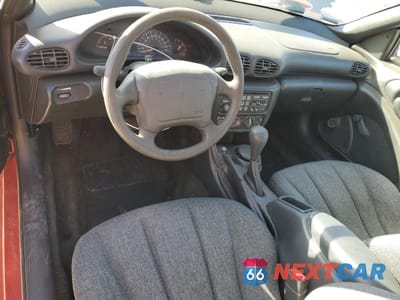 Zdjęcie 8 z 14 samochodu: 1999 PONTIAC SUNFIRE SE VIN:1G2JB1247X7533392 - miniatura