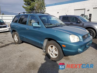 Czwarte zdjęcie samochodu z boku: 2002 HYUNDAI SANTA FE GLS VIN:KM8SC13D92U170093 - miniatura