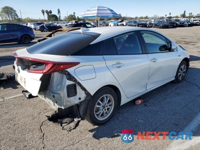Trzecie zdjęcie samochodu z tyłu: 2021 TOYOTA PRIUS PRIME LE VIN:JTDKAMFP5M3175754 - miniatura
