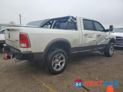 Trzecie zdjęcie samochodu z tyłu: 2018 RAM 1500 LARAMIE VIN:1C6RR7VM7JS255694 - miniatura