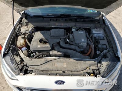 Zdjęcie 11 z 12 samochodu: 2017 FORD FUSION SE HYBRID VIN:3FA6P0LU2HR359694 - miniatura