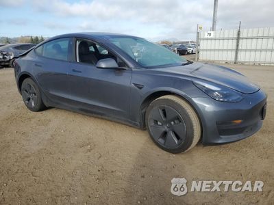 Czwarte zdjęcie samochodu z boku: 2023 TESLA MODEL 3 VIN:5YJ3E1EA8PF677153 - miniatura