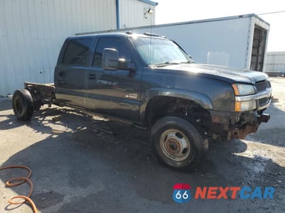 Czwarte zdjęcie samochodu z boku: 2003 CHEVROLET SILVERADO K3500 VIN:1GCJK33103F207512 - miniatura