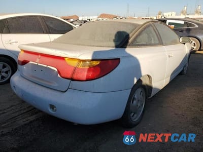 Trzecie zdjęcie samochodu z tyłu: 2002 SATURN SC2 VIN:1G8ZY14712Z192356 - miniatura