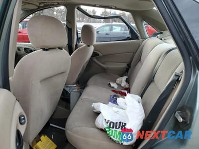 Zdjęcie 10 z 12 samochodu: 2003 FORD FOCUS SE COMFORT VIN:1FAFP34333W104260 - miniatura