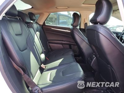 Zdjęcie 10 z 15 samochodu: 2019 FORD FUSION TITANIUM VIN:3FA6P0K93KR286307 - miniatura