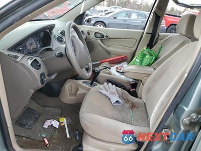 Zdjęcie 7 z 12 samochodu: 2003 FORD FOCUS SE COMFORT VIN:1FAFP34333W104260 - miniatura