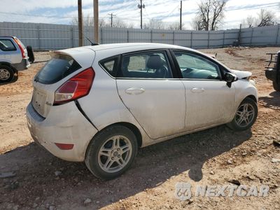 Trzecie zdjęcie samochodu z tyłu: 2018 FORD FIESTA SE VIN:3FADP4EJ3JM122071 - miniatura