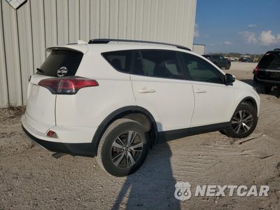 Trzecie zdjęcie samochodu z tyłu: 2017 TOYOTA RAV4 XLE VIN:JTMWFREV8HD092884 - miniatura