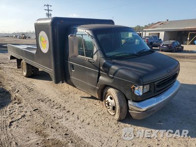Czwarte zdjęcie samochodu z boku: 2000 FORD ECONOLINE E350 SUPER DUTY CUTAWAY VAN VIN:1FDWE35SXYHA79161 - miniatura