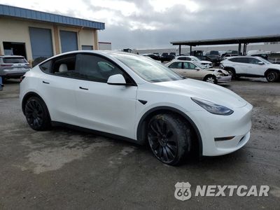 Czwarte zdjęcie samochodu z boku: 2020 TESLA MODEL Y VIN:5YJYGDEF4LF058914 - miniatura