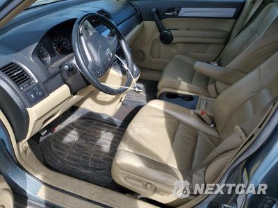 Zdjęcie 7 z 16 samochodu: 2010 HONDA CR-V EXL VIN:JHLRE4H7XAC005436 - miniatura