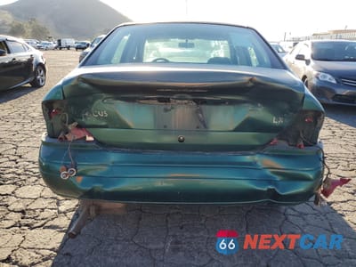 Zdjęcie 6 z 12 samochodu: 2000 FORD FOCUS LX VIN:1FAFP33P3YW215712 - miniatura