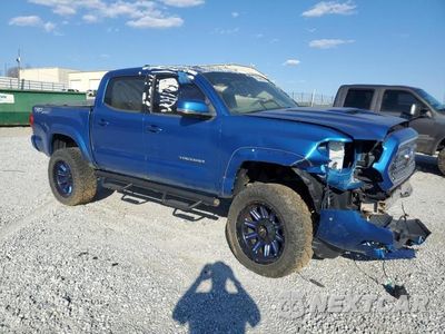 Czwarte zdjęcie samochodu z boku: 2016 TOYOTA TACOMA DOUBLE CAB VIN:5TFCZ5ANXGX018193 - miniatura