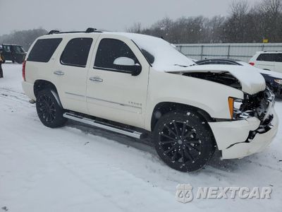Czwarte zdjęcie samochodu z boku: 2011 CHEVROLET TAHOE K1500 LTZ VIN:1GNSKCE06BR384353 - miniatura